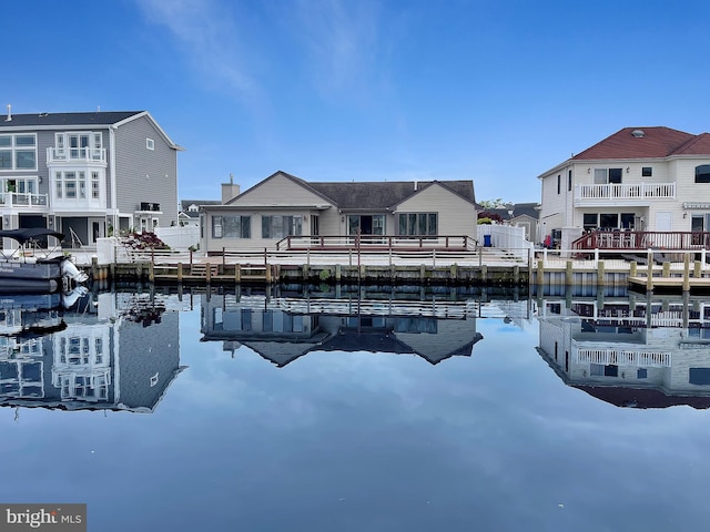 dock area with a water view