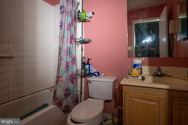 full bathroom with vanity, toilet, and shower / bath combo