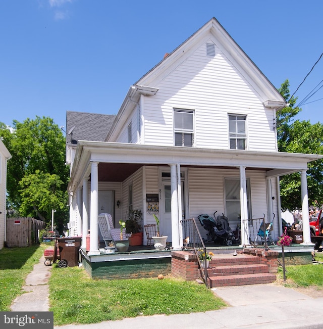 view of front of property featuring covered porch