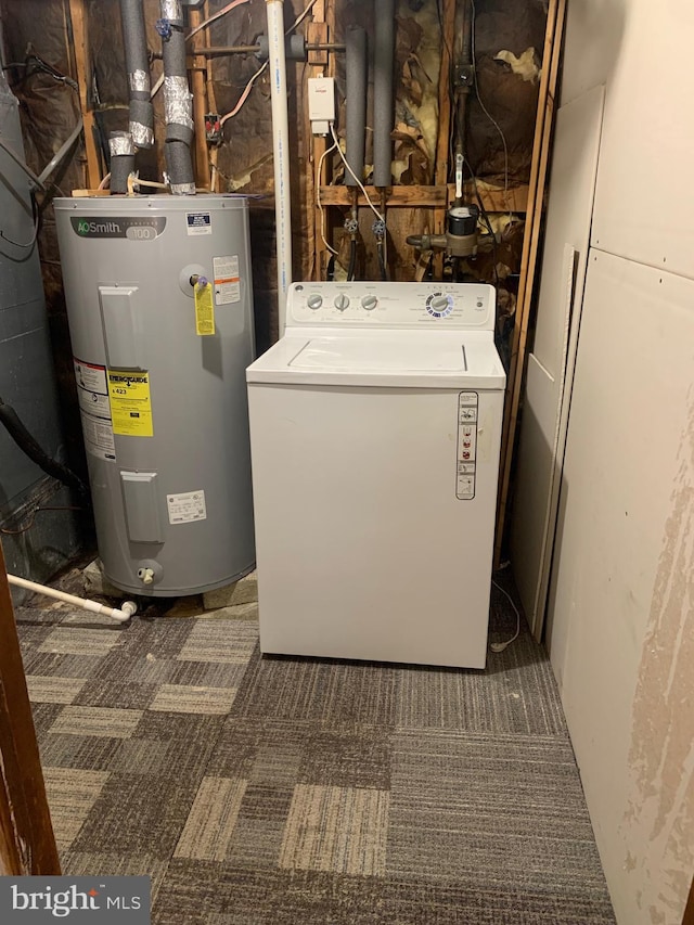 utilities featuring washer / dryer and electric water heater