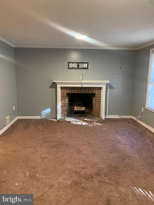 unfurnished living room with electric panel, carpet, ornamental molding, and a fireplace