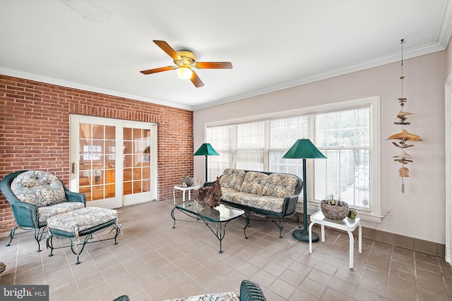 tiled living room with brick wall, ceiling fan, and french doors