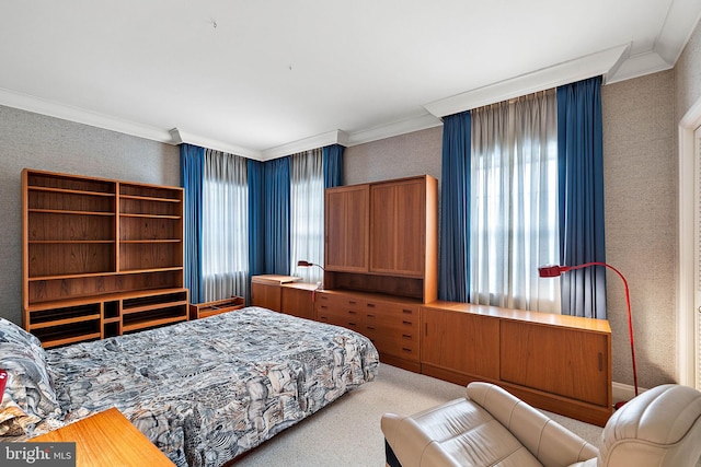 carpeted bedroom with crown molding