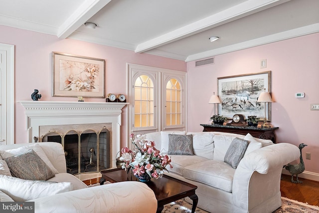 living room featuring beamed ceiling, ornamental molding, and hardwood / wood-style flooring