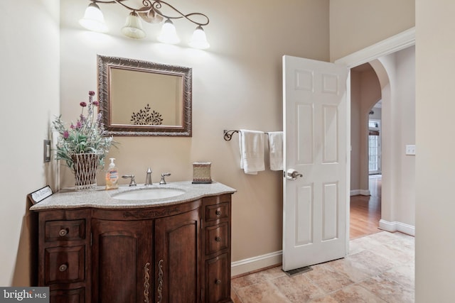 bathroom featuring tile floors and vanity