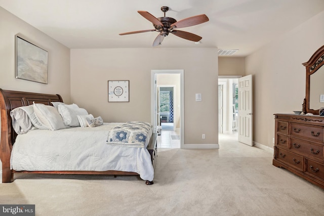 bedroom featuring ceiling fan and carpet floors