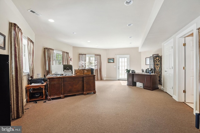 home office with light colored carpet