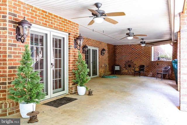 view of patio / terrace featuring french doors and ceiling fan