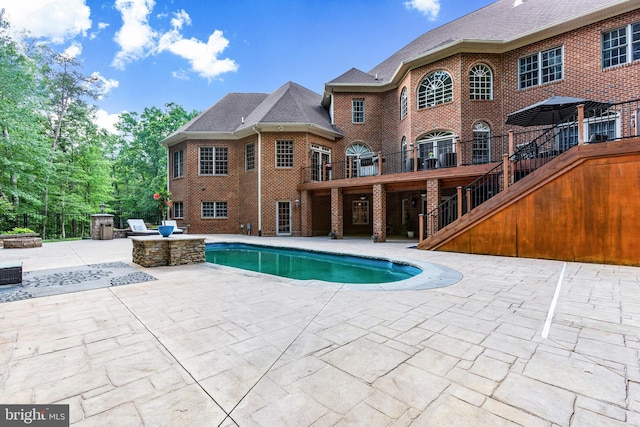 view of pool with a patio