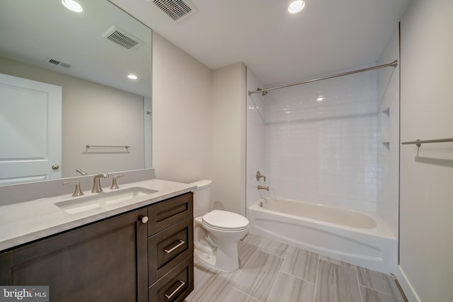 full bathroom with tile floors,  shower combination, vanity, and toilet