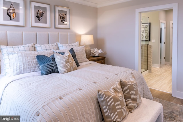 bedroom with wood-type flooring