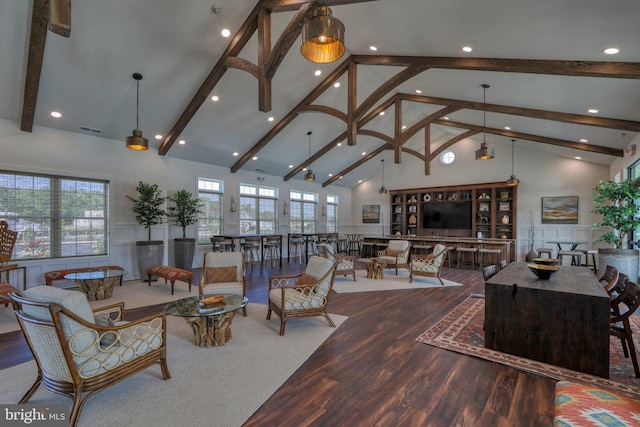 living room with high vaulted ceiling, beamed ceiling, and wood-type flooring