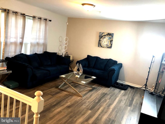 living room with dark wood-type flooring