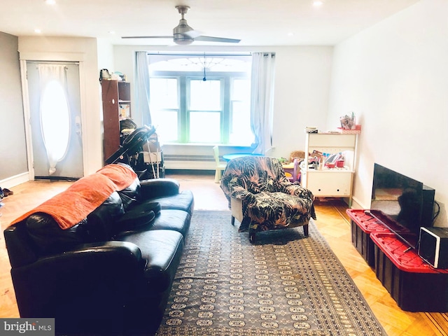 living room with ceiling fan and parquet floors