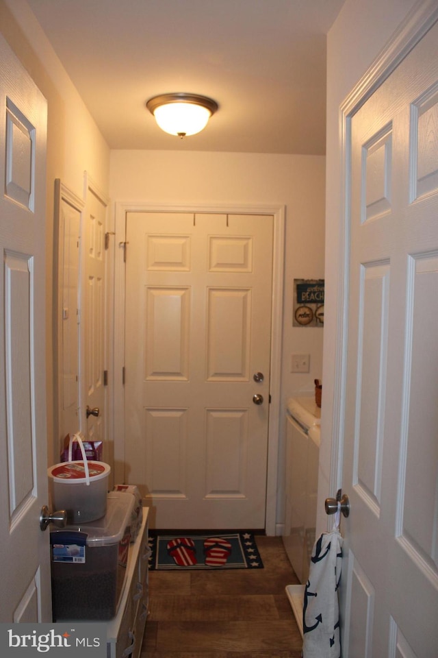 doorway to outside with dark hardwood / wood-style flooring