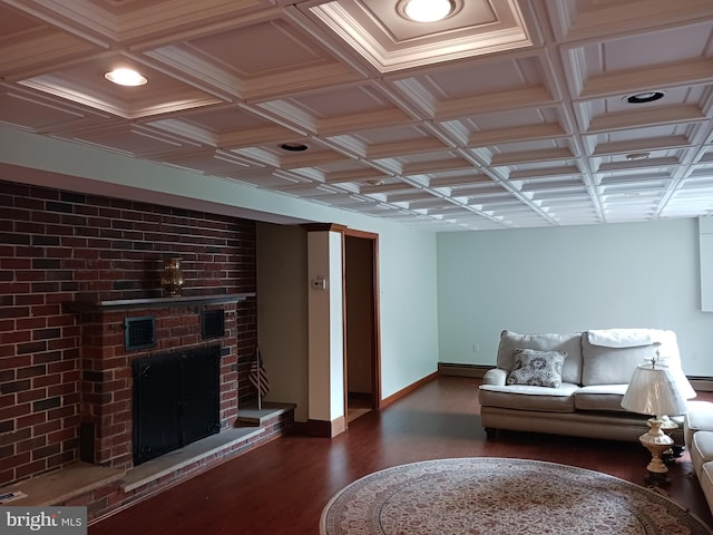 living room with a fireplace, dark hardwood / wood-style flooring, a baseboard radiator, and coffered ceiling