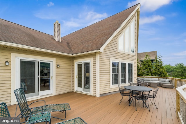 deck with an outdoor living space