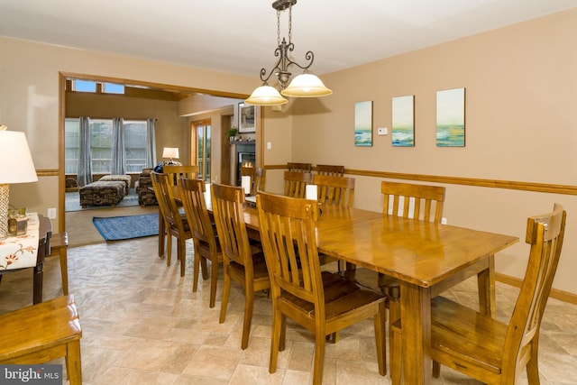 dining area with light tile flooring