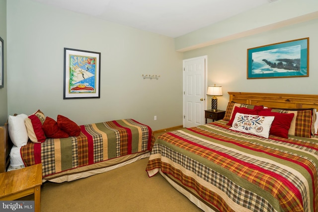 bedroom featuring carpet