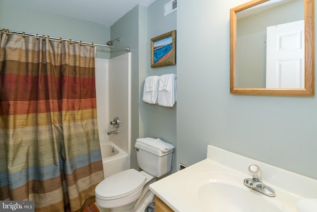 full bathroom featuring shower / bathtub combination with curtain, vanity, and toilet