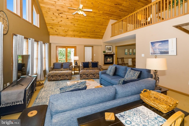 living room with high vaulted ceiling, wood ceiling, and ceiling fan