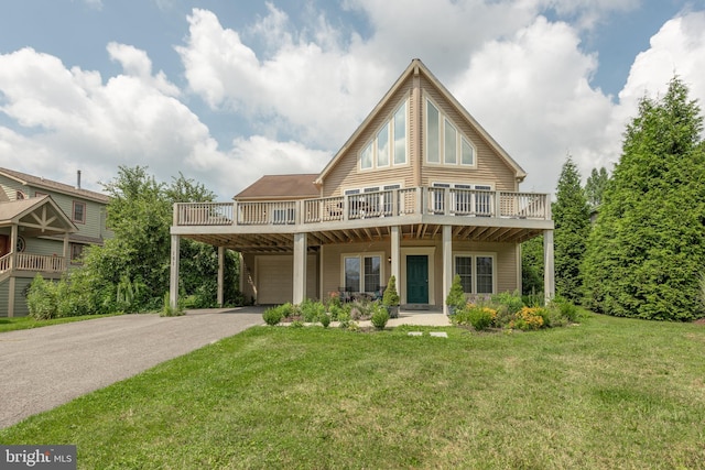 view of front of house featuring a garage and a front lawn