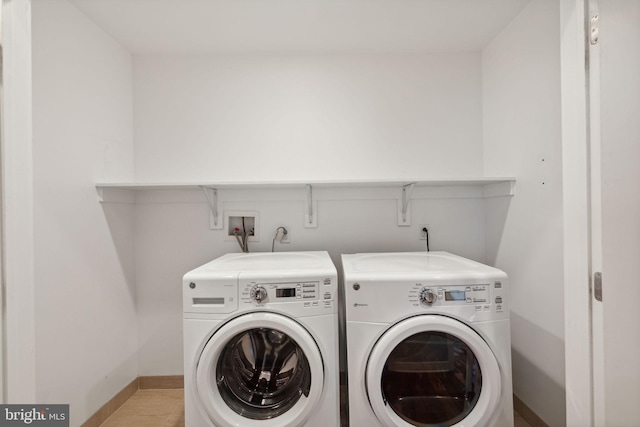 washroom with washer and clothes dryer