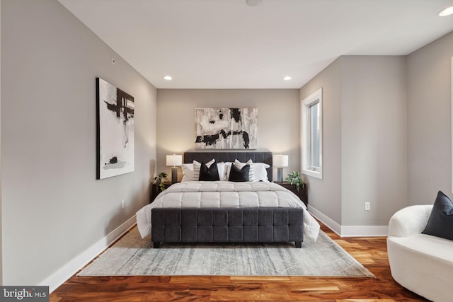 bedroom featuring hardwood / wood-style floors