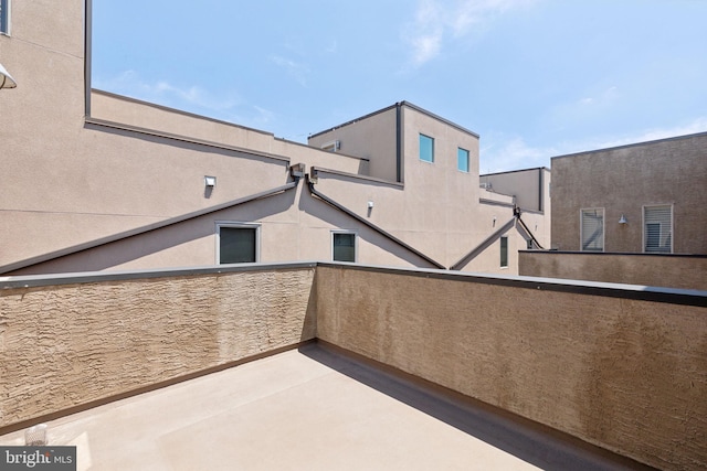 view of patio with a balcony