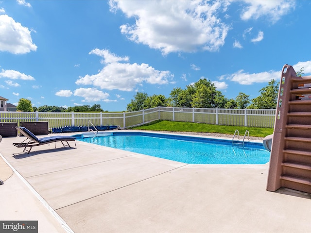 view of pool with a patio area