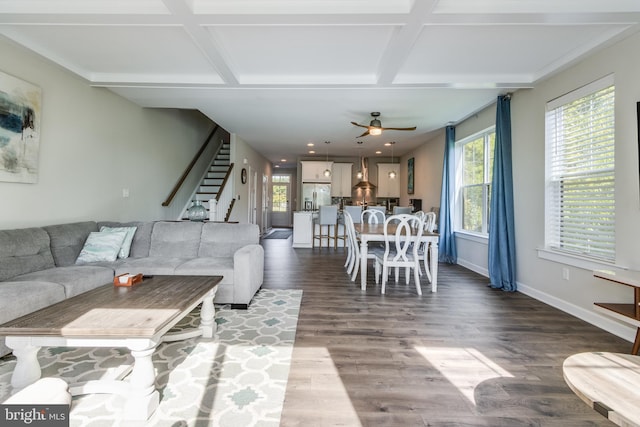 living room with coffered ceiling, ceiling fan, and wood-type flooring