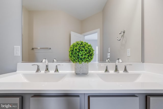 bathroom featuring double sink and oversized vanity