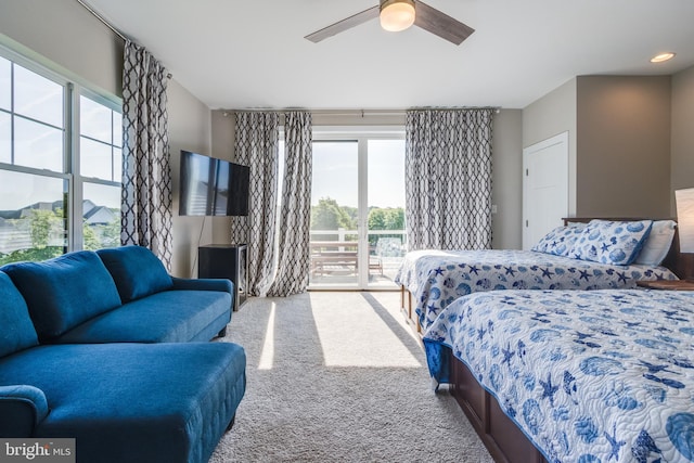 bedroom featuring carpet, ceiling fan, and access to exterior