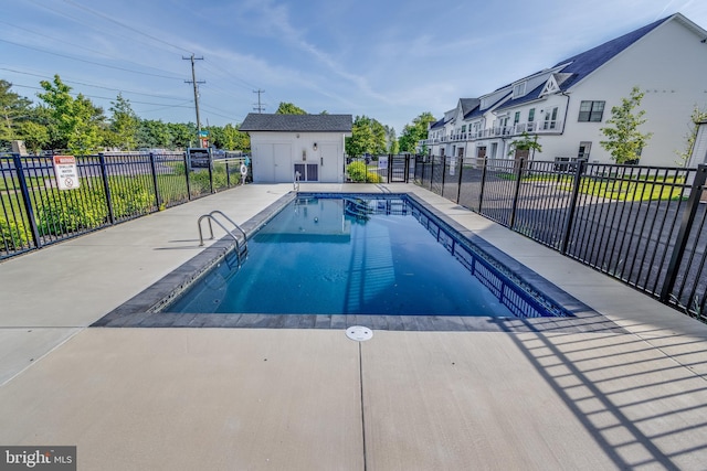 view of pool featuring a patio