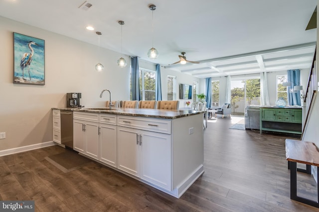 kitchen featuring white cabinetry, ceiling fan, and dark hardwood / wood-style flooring