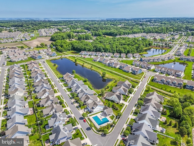 drone / aerial view with a water view