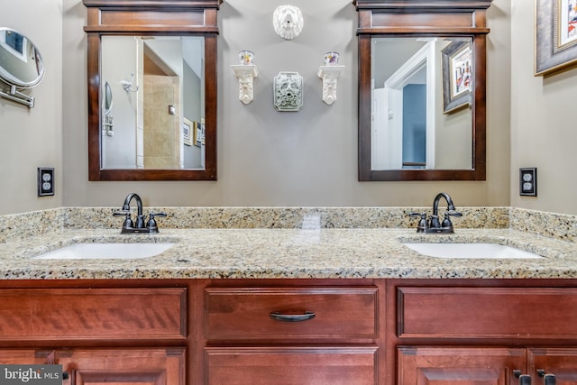 bathroom featuring dual vanity