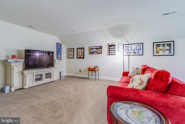 living room featuring vaulted ceiling and light colored carpet