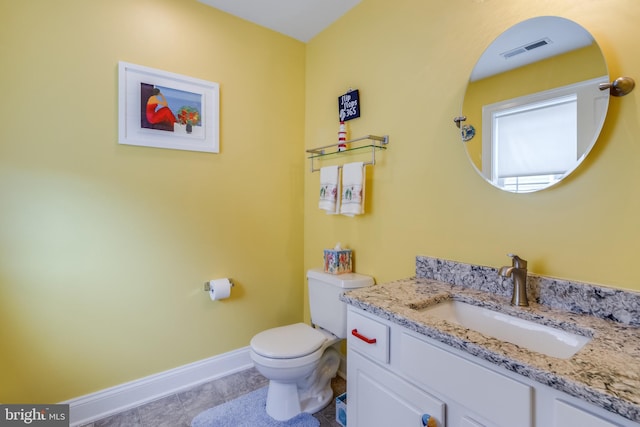 bathroom with oversized vanity and toilet