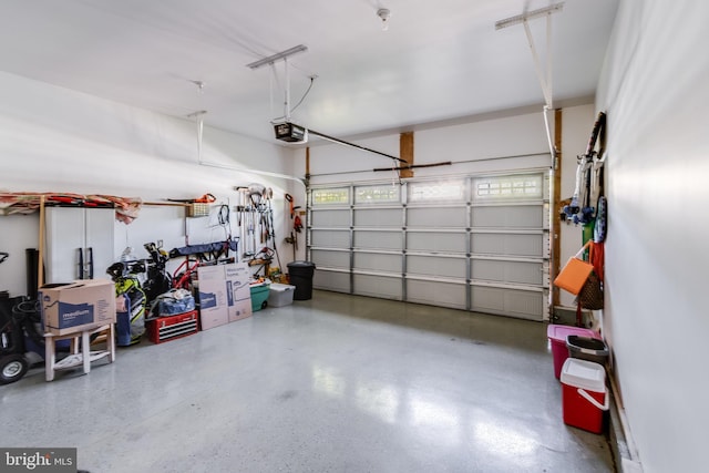 garage featuring a garage door opener