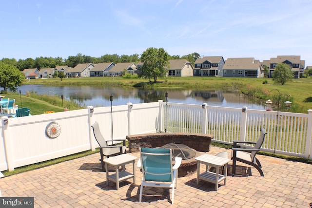 view of patio / terrace with a water view