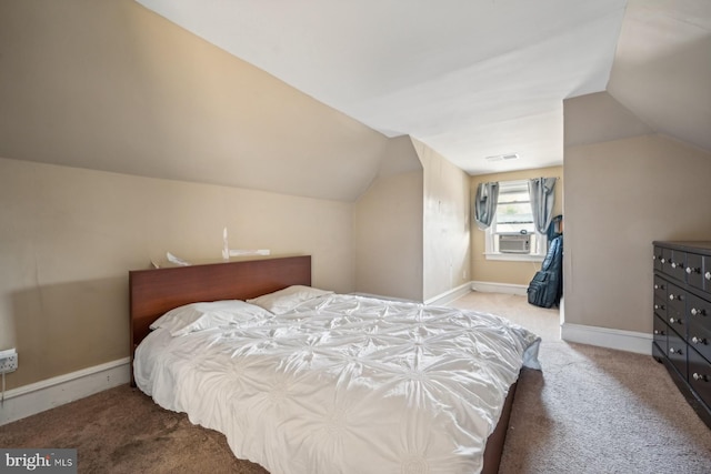 carpeted bedroom featuring cooling unit and lofted ceiling