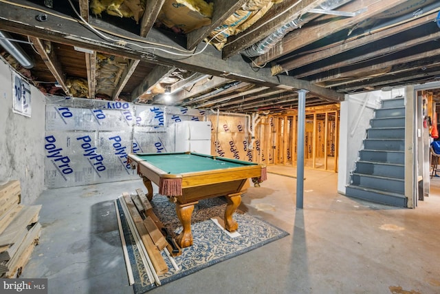 playroom with concrete flooring and billiards