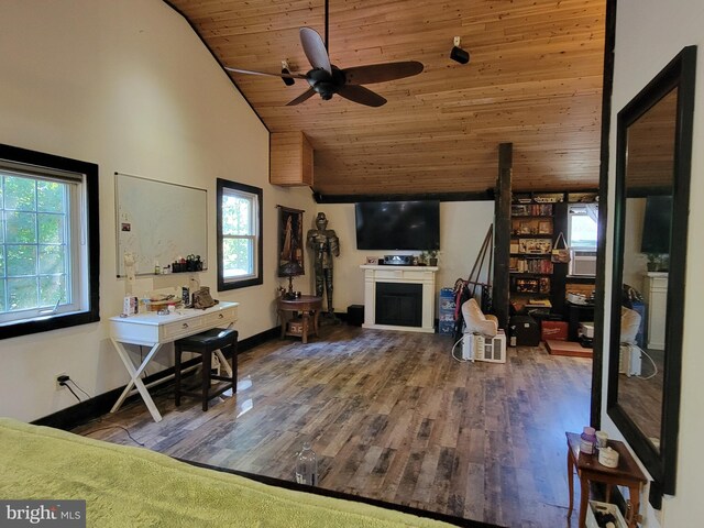 living room with hardwood / wood-style floors, ceiling fan, wooden ceiling, and vaulted ceiling