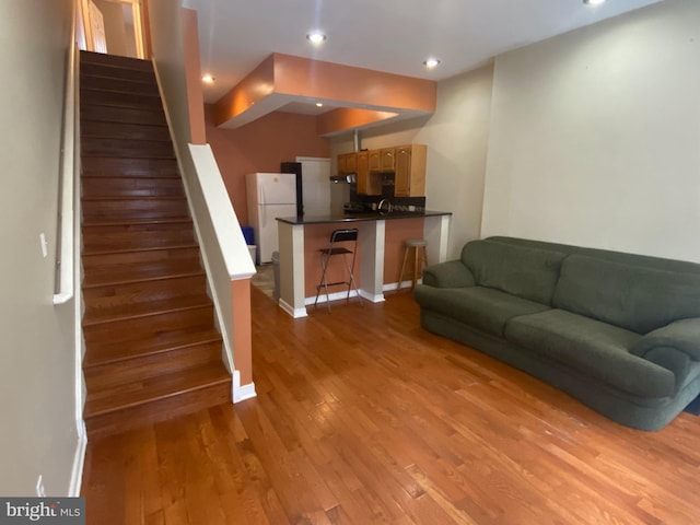 living room with hardwood / wood-style flooring