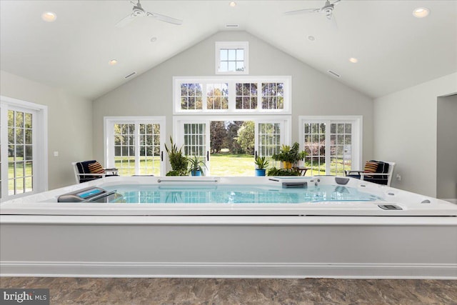 view of pool featuring ceiling fan and a hot tub