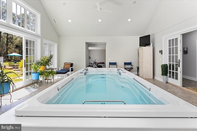 view of swimming pool featuring ceiling fan