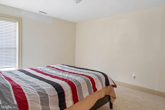 bedroom featuring carpet flooring