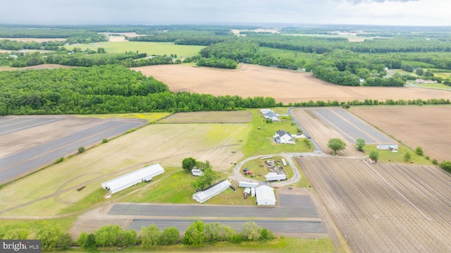 birds eye view of property with a rural view