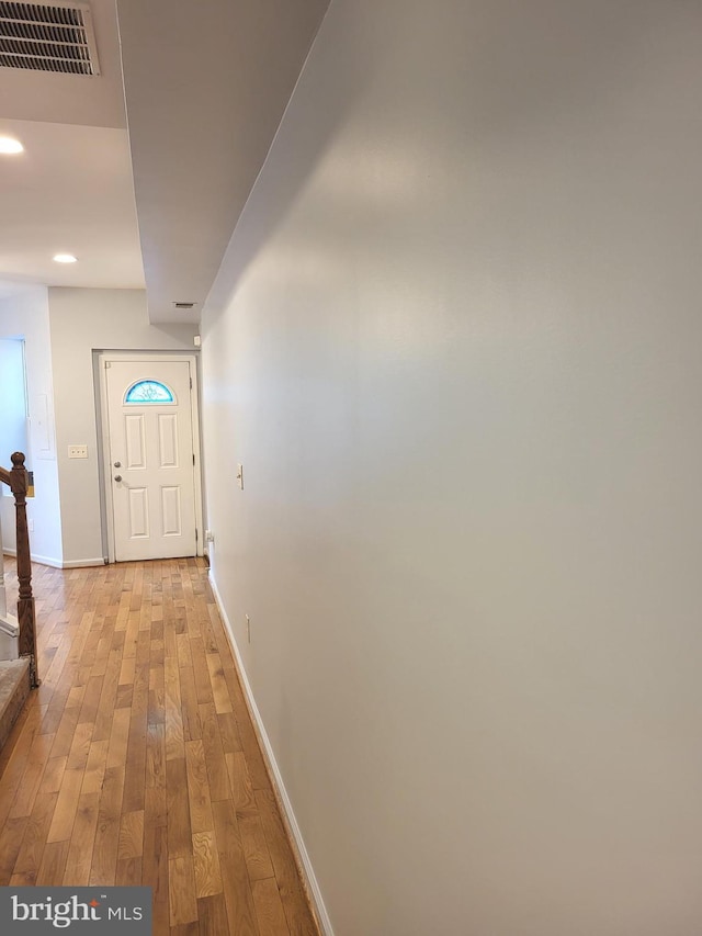 entryway with light hardwood / wood-style floors